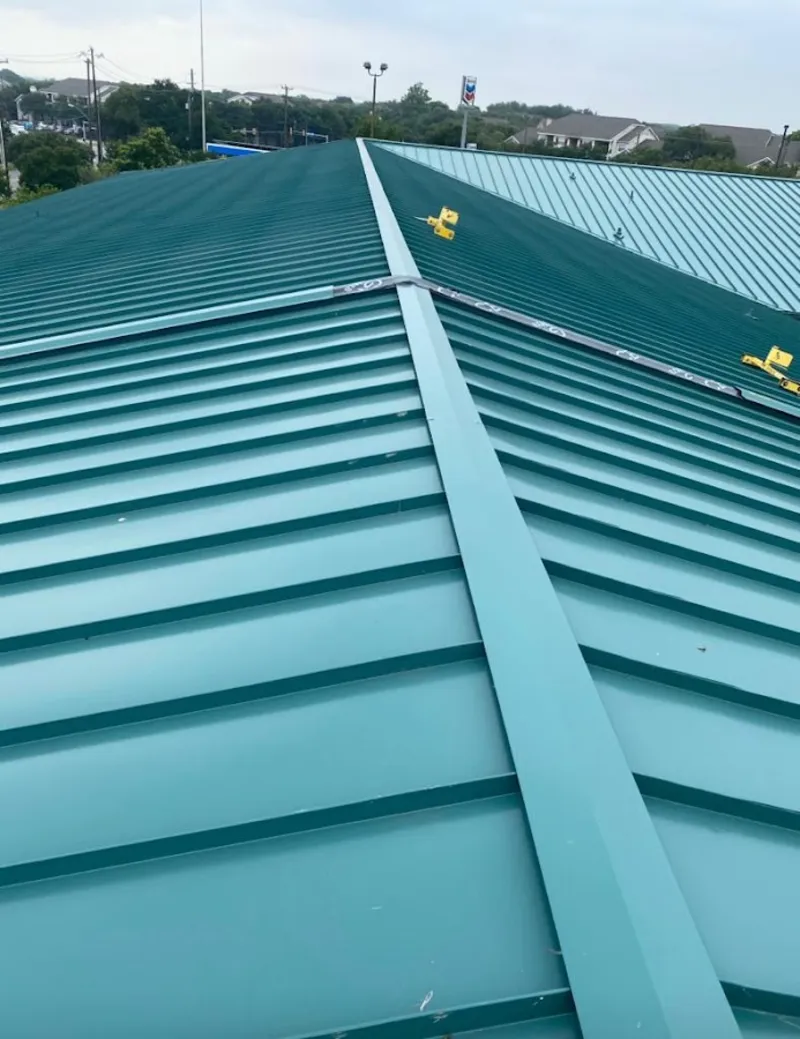 Green commercial metal roof ridge and valley for Metal Roof Repair in Northglenn