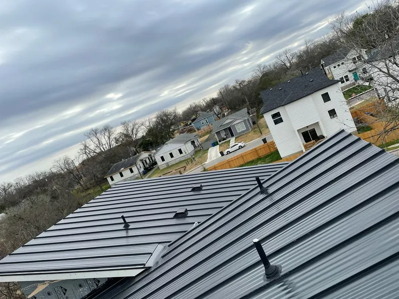 Standing seam metal roof panels with vents for Skylight Repair in Northglenn